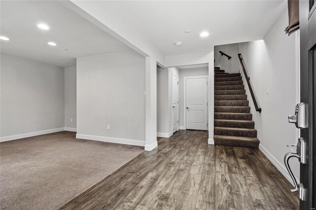 unfurnished living room with carpet floors