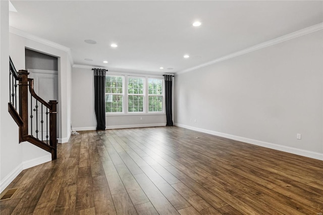 interior space with dark wood-style flooring, crown molding, recessed lighting, stairway, and baseboards