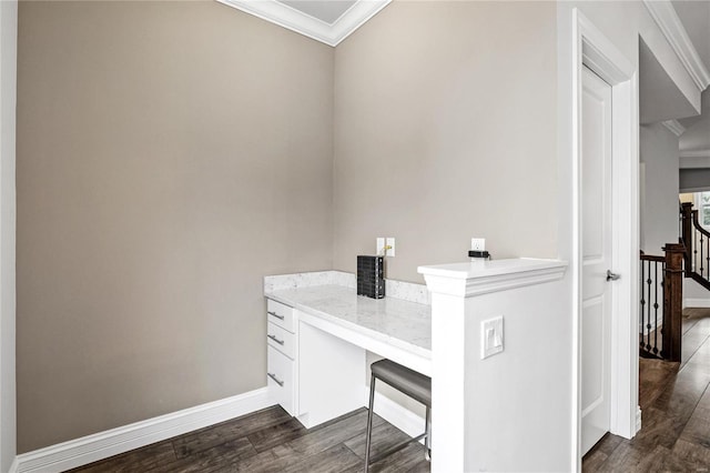 interior space with baseboards, dark wood finished floors, and crown molding