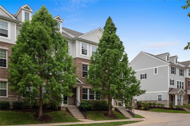 view of front of property with brick siding