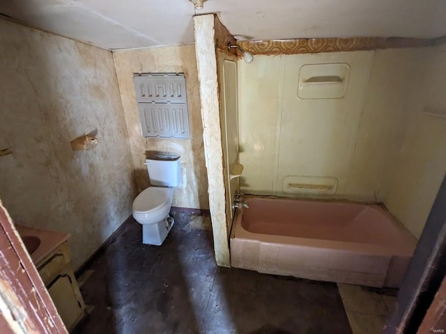 bathroom featuring tub / shower combination and toilet