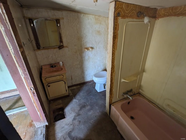 full bathroom featuring toilet, sink, and shower / bathing tub combination