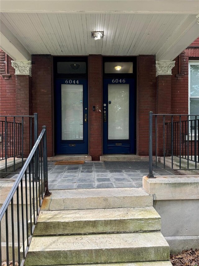 property entrance with a porch