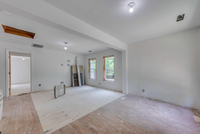 unfurnished room featuring light wood-type flooring