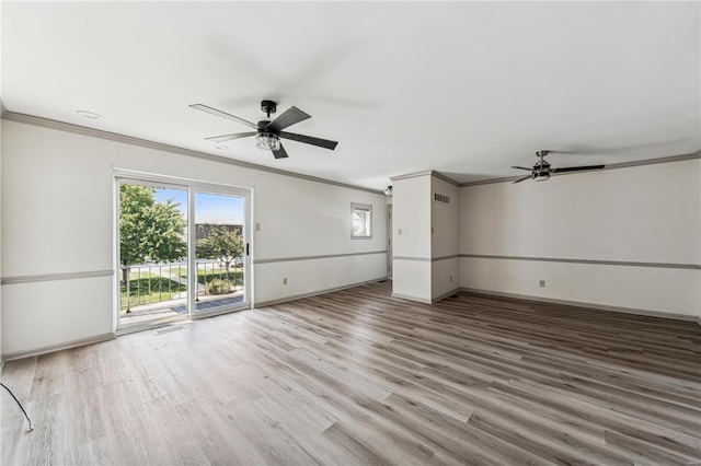 unfurnished living room with ceiling fan, hardwood / wood-style floors, and crown molding