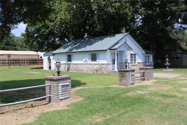 view of front of property with a front lawn