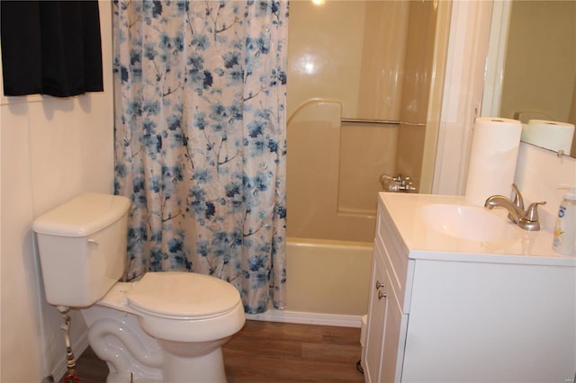 full bathroom featuring vanity, shower / tub combo, wood-type flooring, and toilet