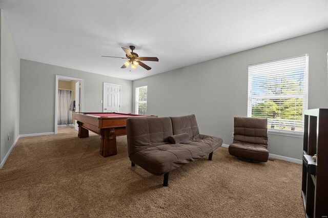 rec room with ceiling fan, billiards, and light carpet