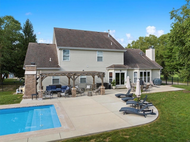 rear view of property with a patio area, a fenced in pool, fence, and a pergola