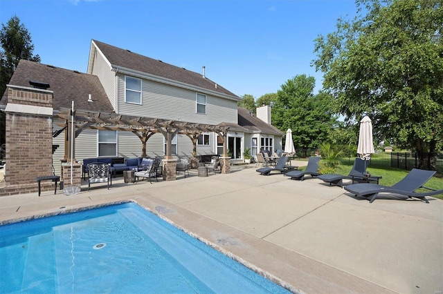 view of pool with a pergola and a patio area