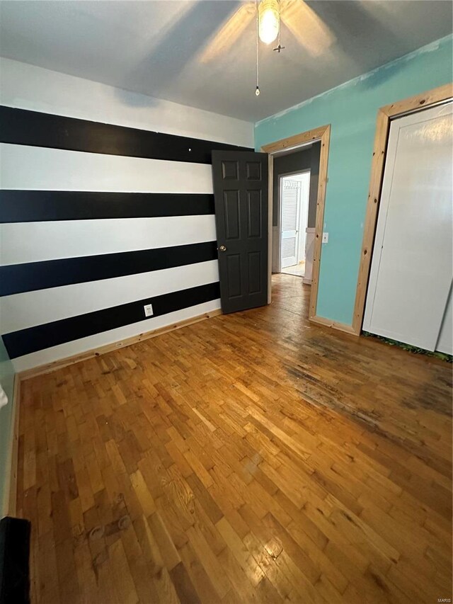 unfurnished room featuring wood-type flooring