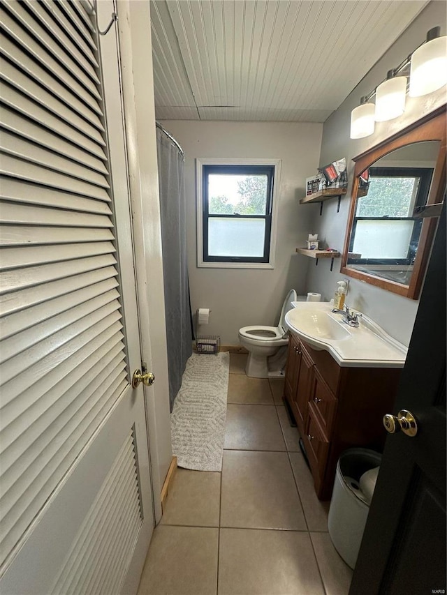 bathroom with curtained shower, tile patterned flooring, vanity, wood ceiling, and toilet