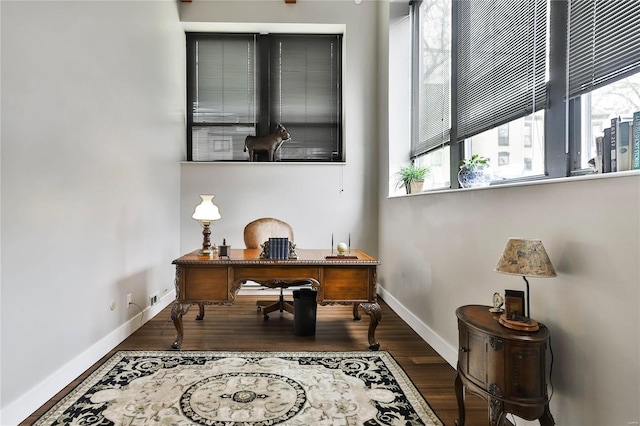 home office featuring hardwood / wood-style flooring and plenty of natural light