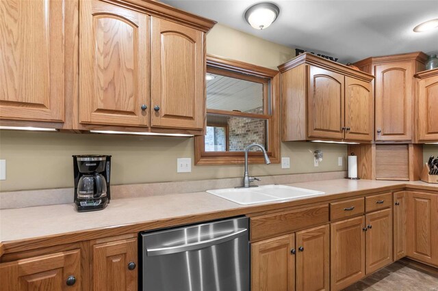 kitchen with dishwasher and sink