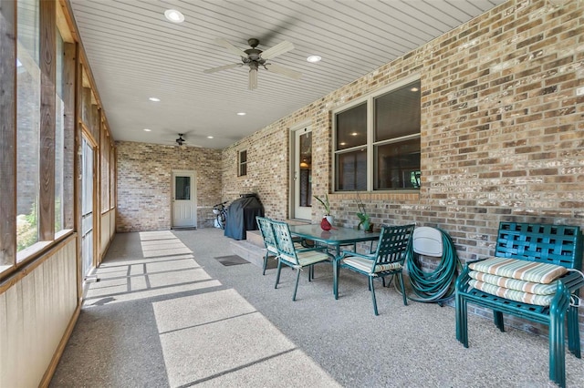 view of patio / terrace with outdoor dining area and a ceiling fan