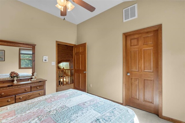 bedroom featuring light carpet and ceiling fan