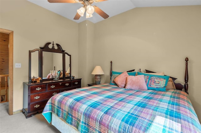 carpeted bedroom featuring lofted ceiling and ceiling fan