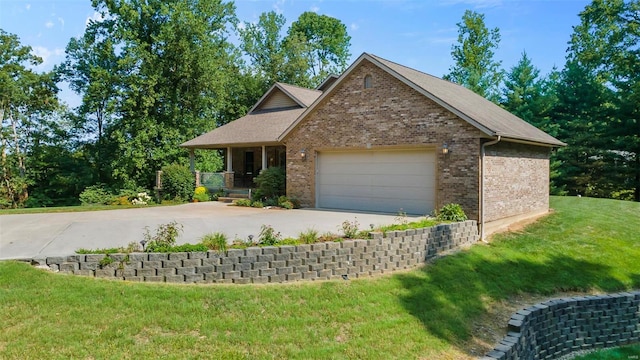 view of front facade with driveway, an attached garage, a front lawn, a porch, and brick siding