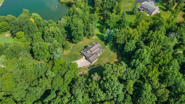 bird's eye view featuring a water view and a wooded view