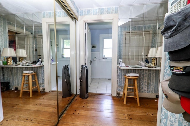 bathroom with wood-type flooring