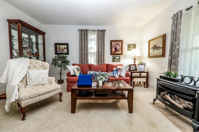 sitting room featuring carpet flooring