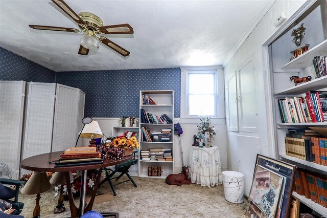 carpeted office featuring ceiling fan