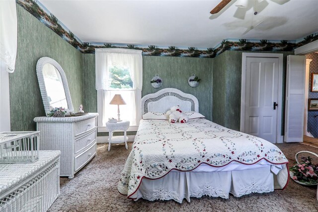 bedroom featuring carpet and ceiling fan