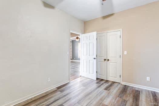 unfurnished bedroom with light hardwood / wood-style flooring