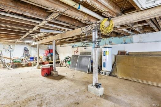 basement featuring water heater