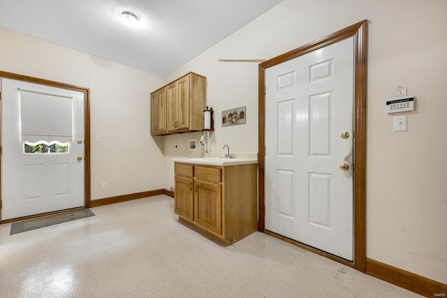 laundry area featuring cabinets, hookup for a washing machine, and sink