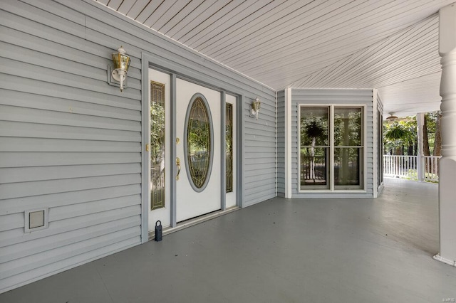 entrance to property with a porch