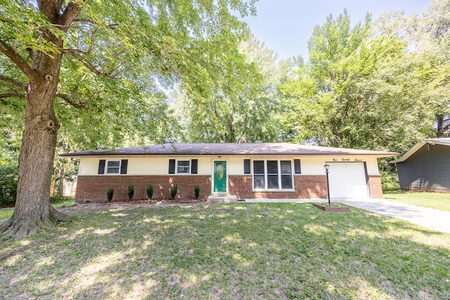 single story home with a front yard and a garage