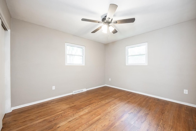 unfurnished room featuring ceiling fan and wood-type flooring