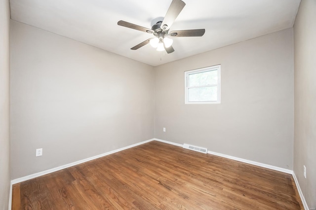 unfurnished room featuring wood-type flooring and ceiling fan