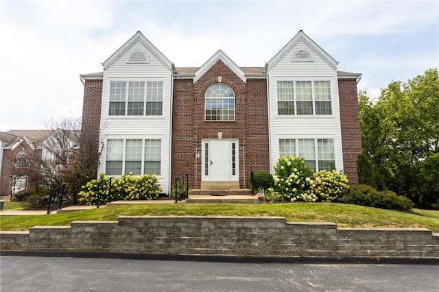 view of front of home with a front yard