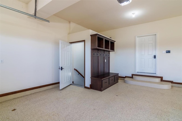 garage with baseboards