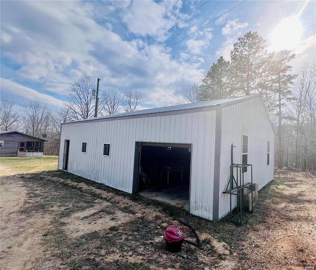 view of outdoor structure with a garage