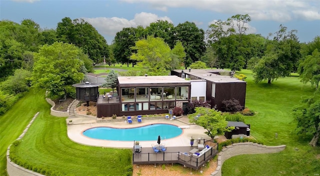 exterior space featuring a sunroom and a patio