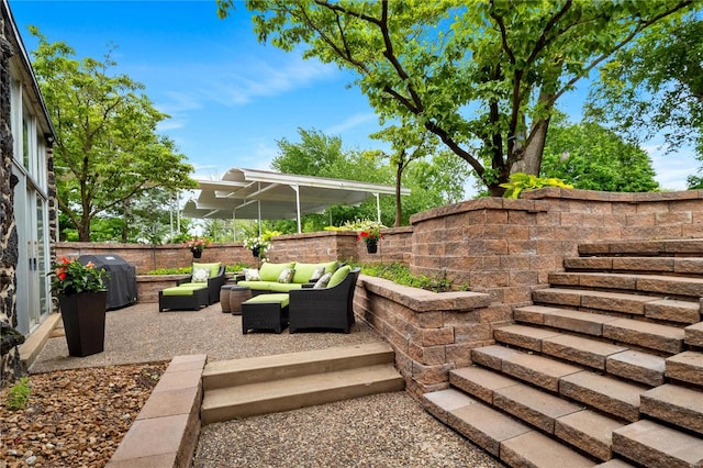 view of patio / terrace with grilling area and an outdoor living space