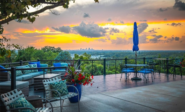 patio terrace at dusk with an outdoor hangout area