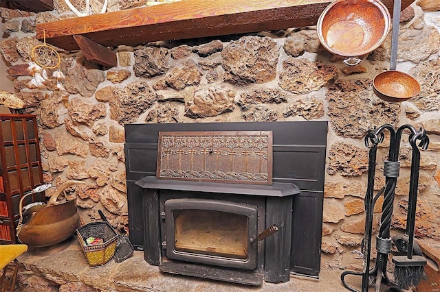 room details featuring a wood stove