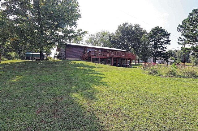 view of yard featuring a deck