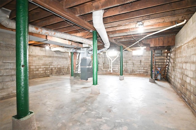 basement featuring heating unit