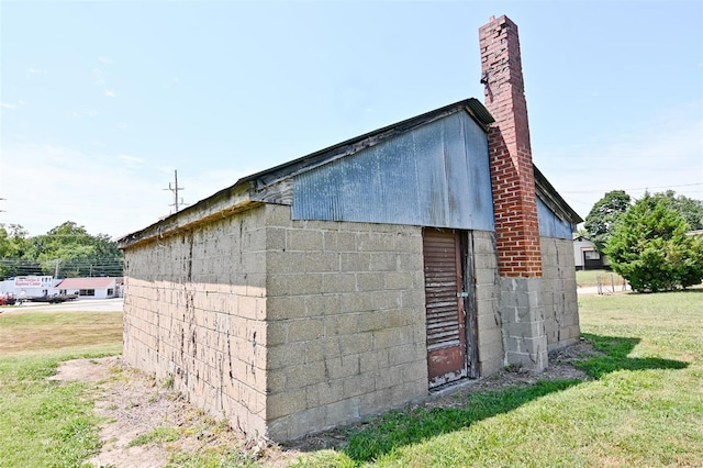 view of property exterior featuring a yard