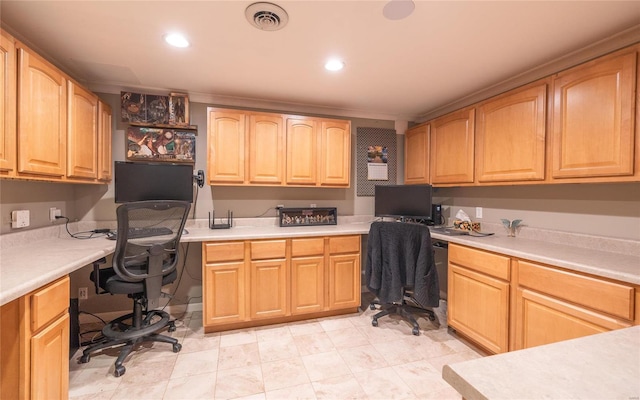 kitchen featuring visible vents, light countertops, and built in study area