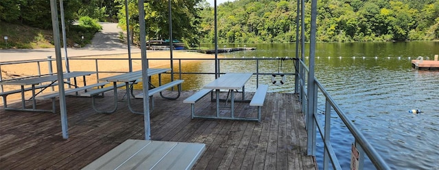 view of dock with a water view