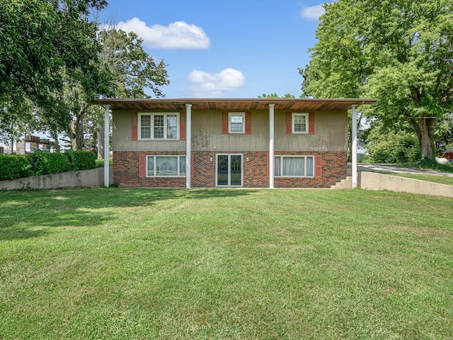 bi-level home with a front yard