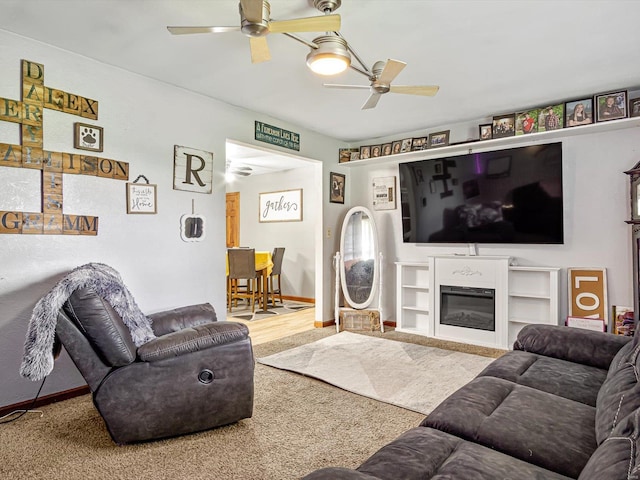 living room featuring ceiling fan