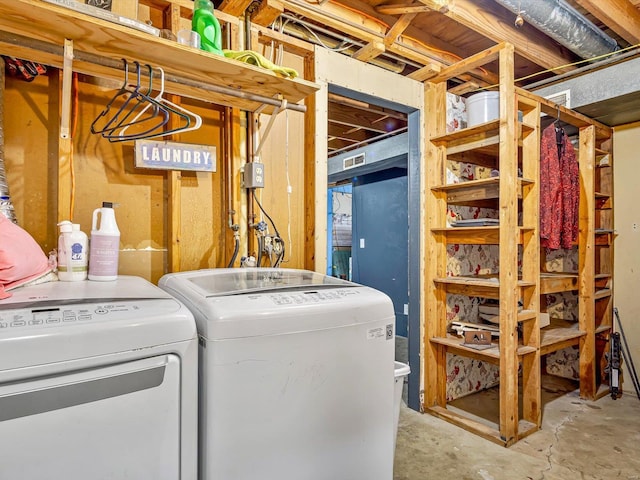 laundry area with washing machine and clothes dryer