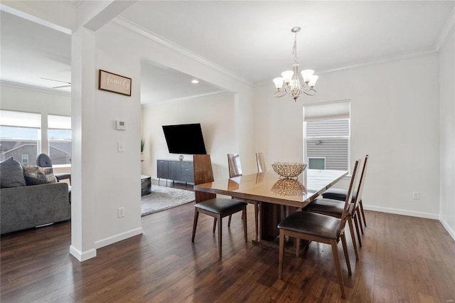 dining room with crown molding, dark hardwood / wood-style flooring, and a notable chandelier